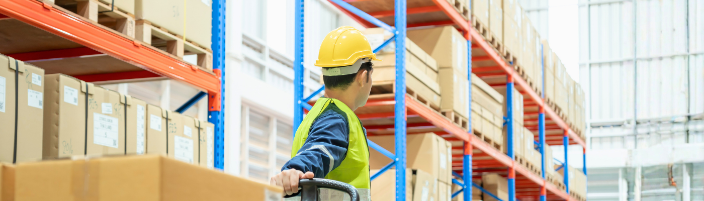 Warehouse worker pull pallet truck