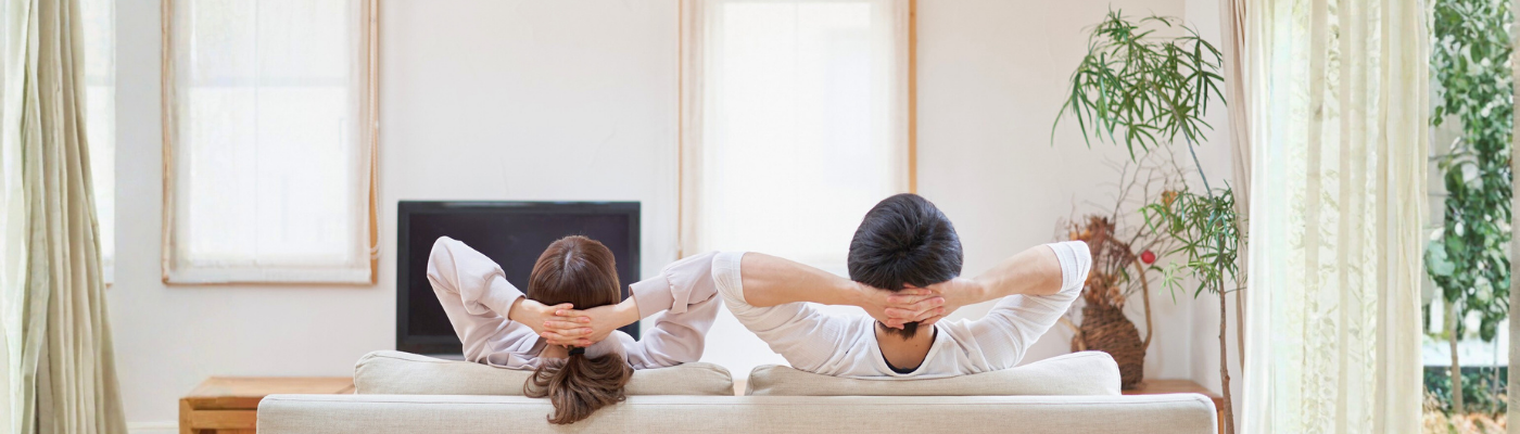 Couple on sofa in living room