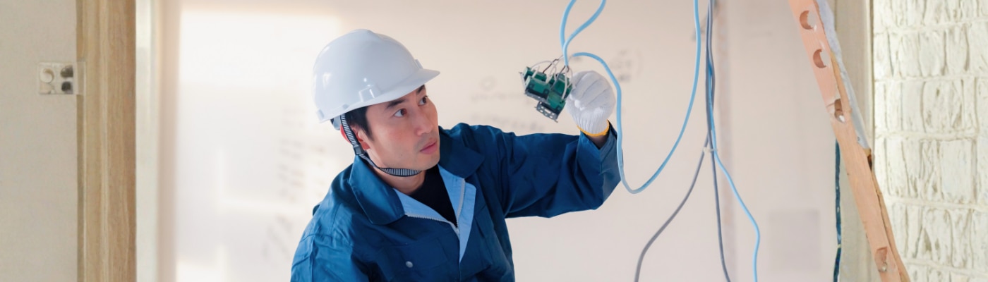Electrician working on wiring