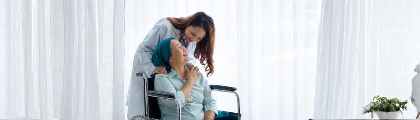Female doctor was encouraging and inquiring about the symptoms of the elderly patient
