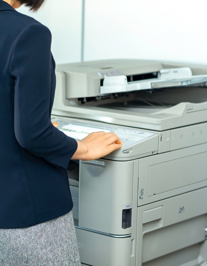 Woman using printer