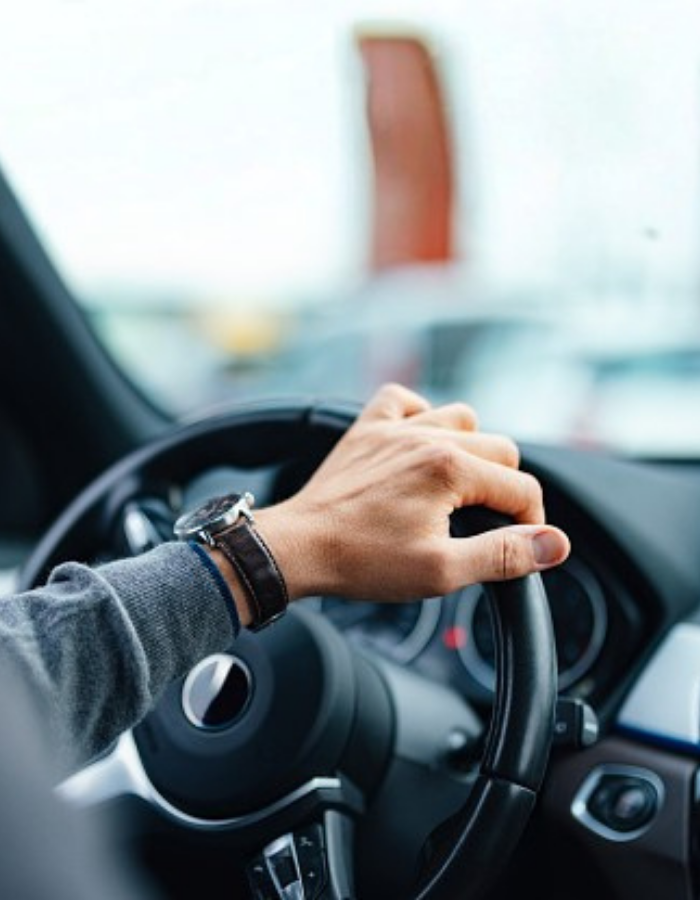 Driver behind the wheel