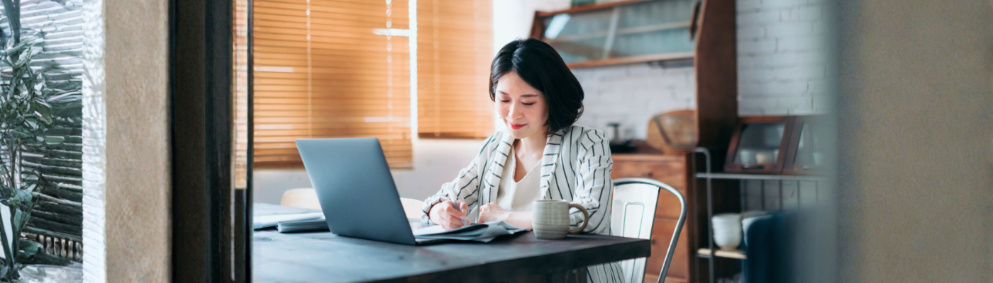 Young Asian woman using laptop 